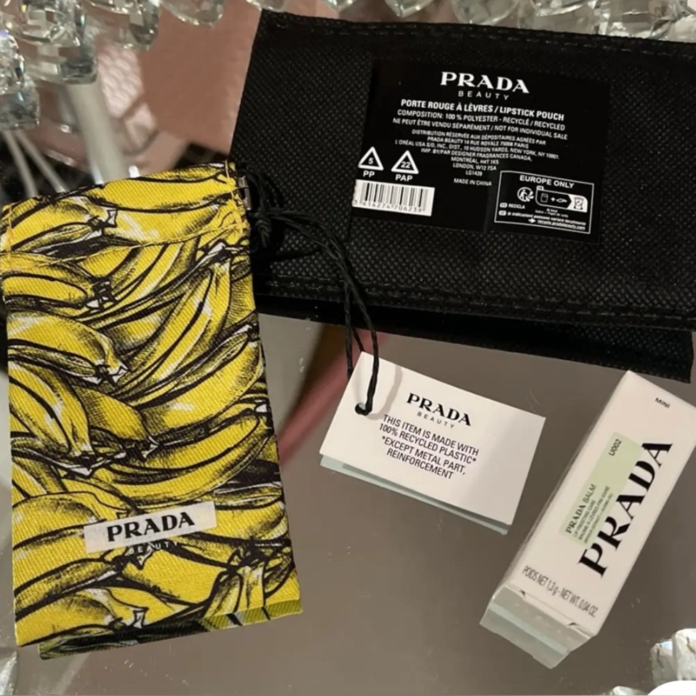 Prada Beauty Holiday banana balm, and lipstick pouch